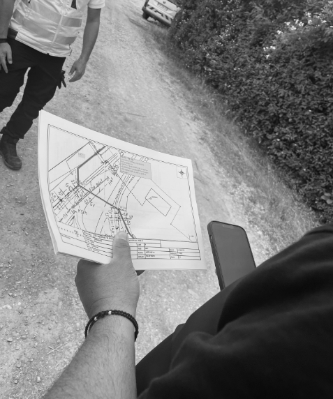 Engineer reading a network plan